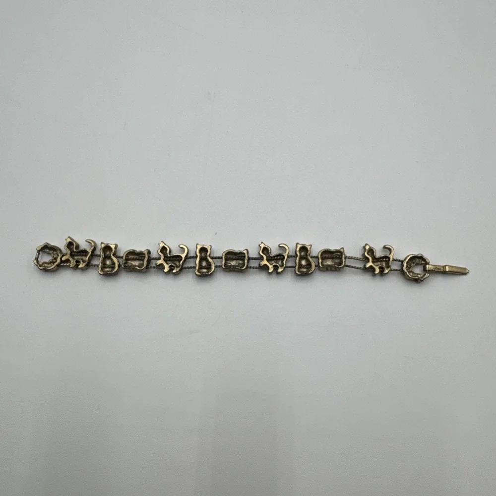 Vintage Avon Gold Tone Sliding Cat Charm Bracelet Rhinestone Red Heart Marked SP